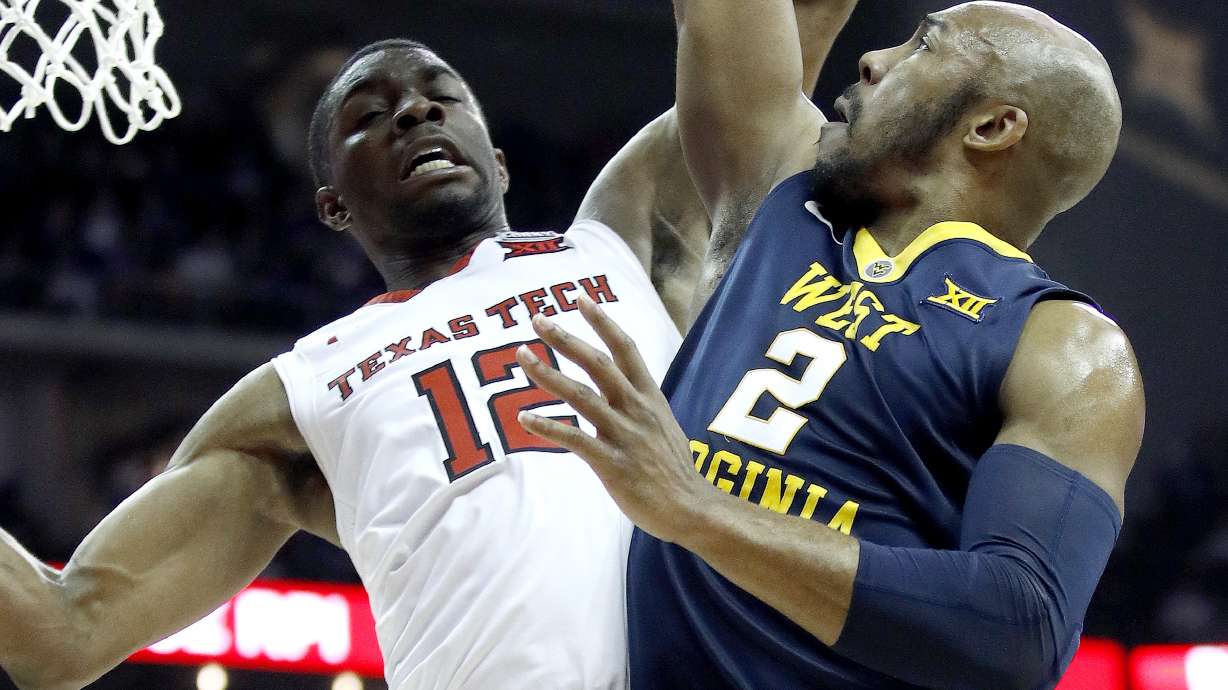 No. 18 West Virginia tops No. 14 Texas Tech 66-63 at Big 12s