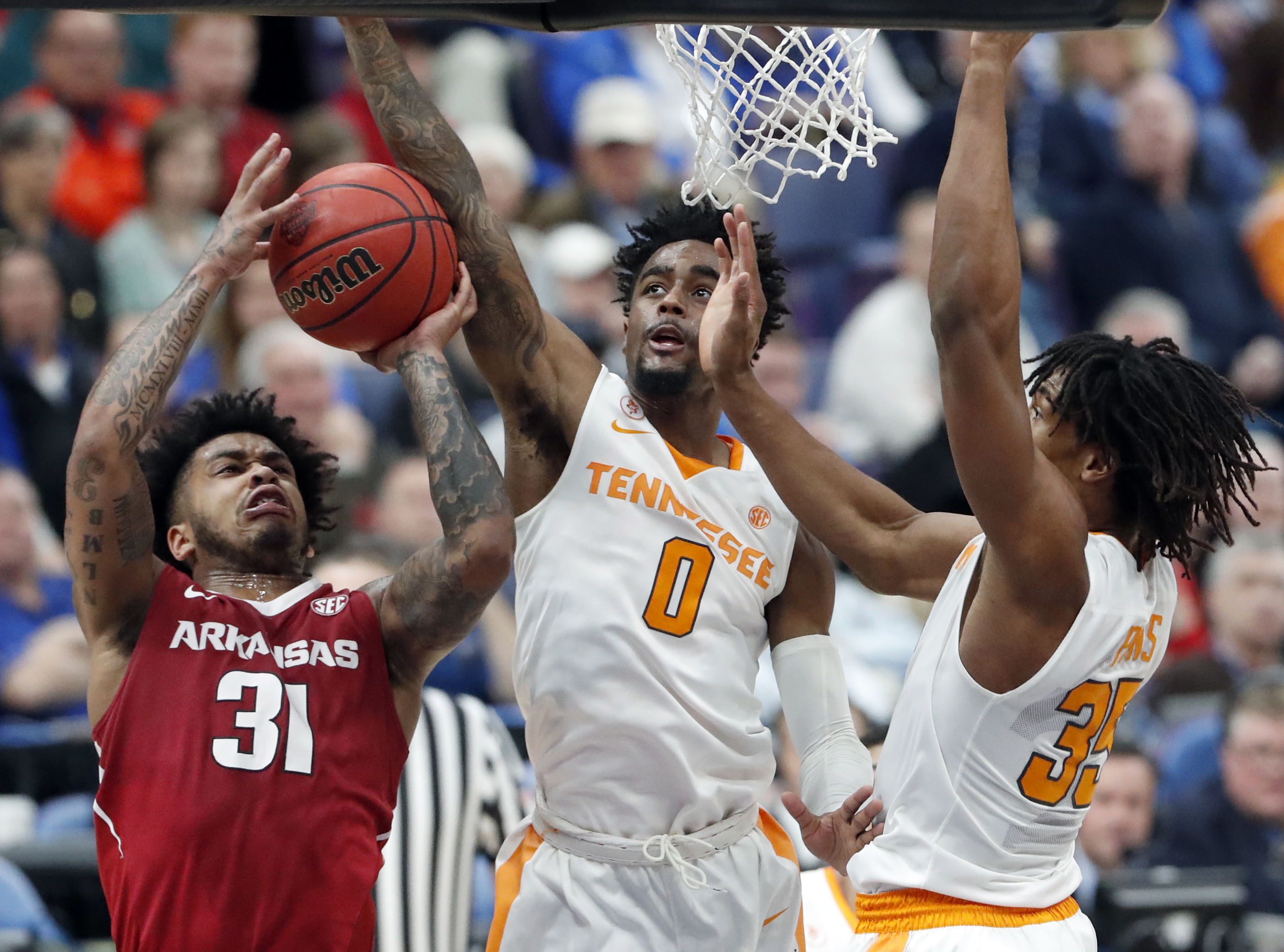 Bone leads hot-shooting Tennessee past Arkansas 84-66