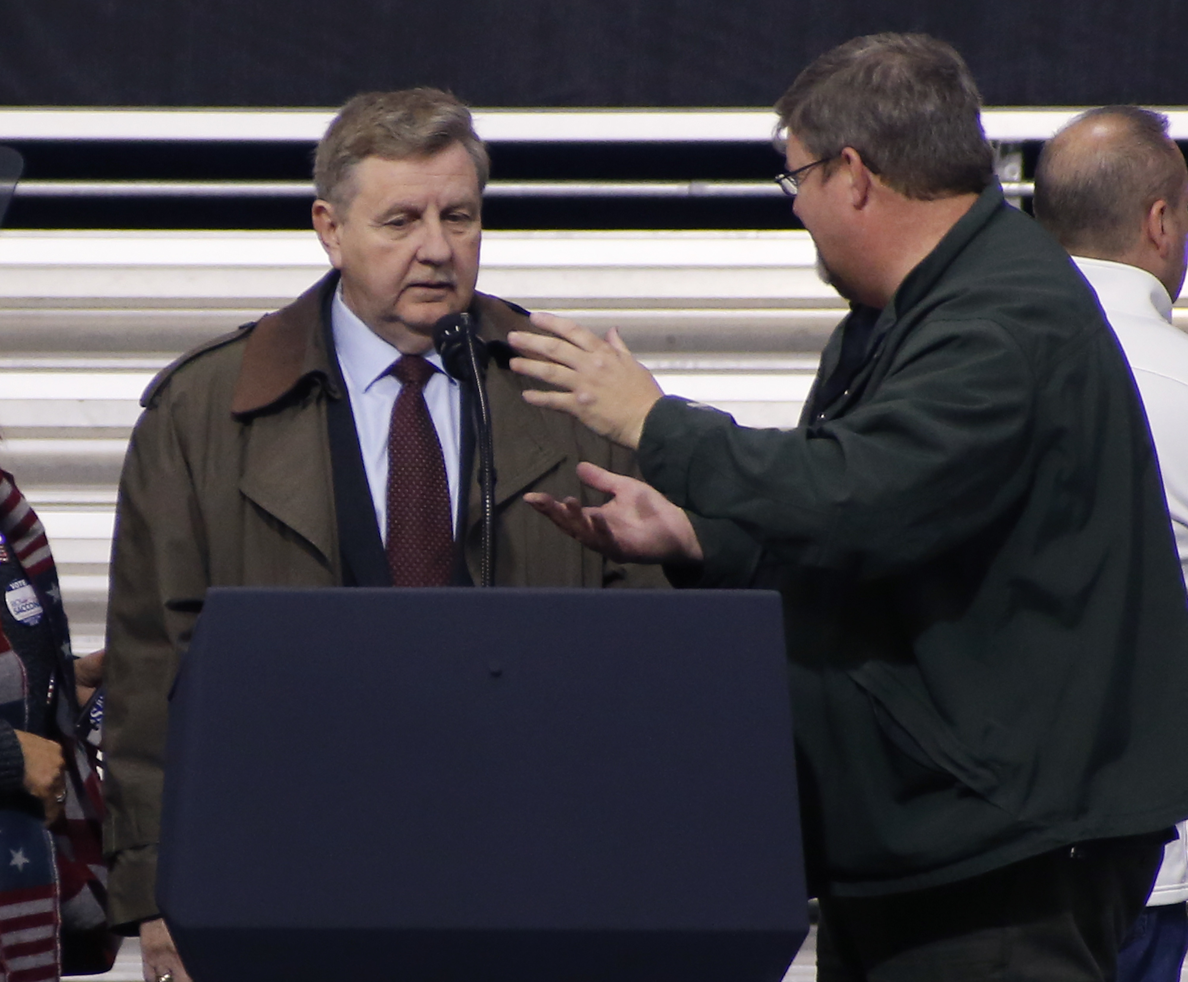 The Latest: Trump urges support for GOP House candidate