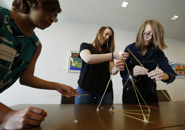 Brandy Mendoza, Shealyn Grimes and McKenzie Wilcox do a team-building exercise at Goldman Sachs in Salt Lake City on Wednesday, March 7, 2018. The Governor's Committee on Employment for People with Disabilities hosted a Transition Mentoring Day at Goldman Sachs for 20 students with disabilities ages 14-21. (Photo: Jeffrey D. Allred, KSL)