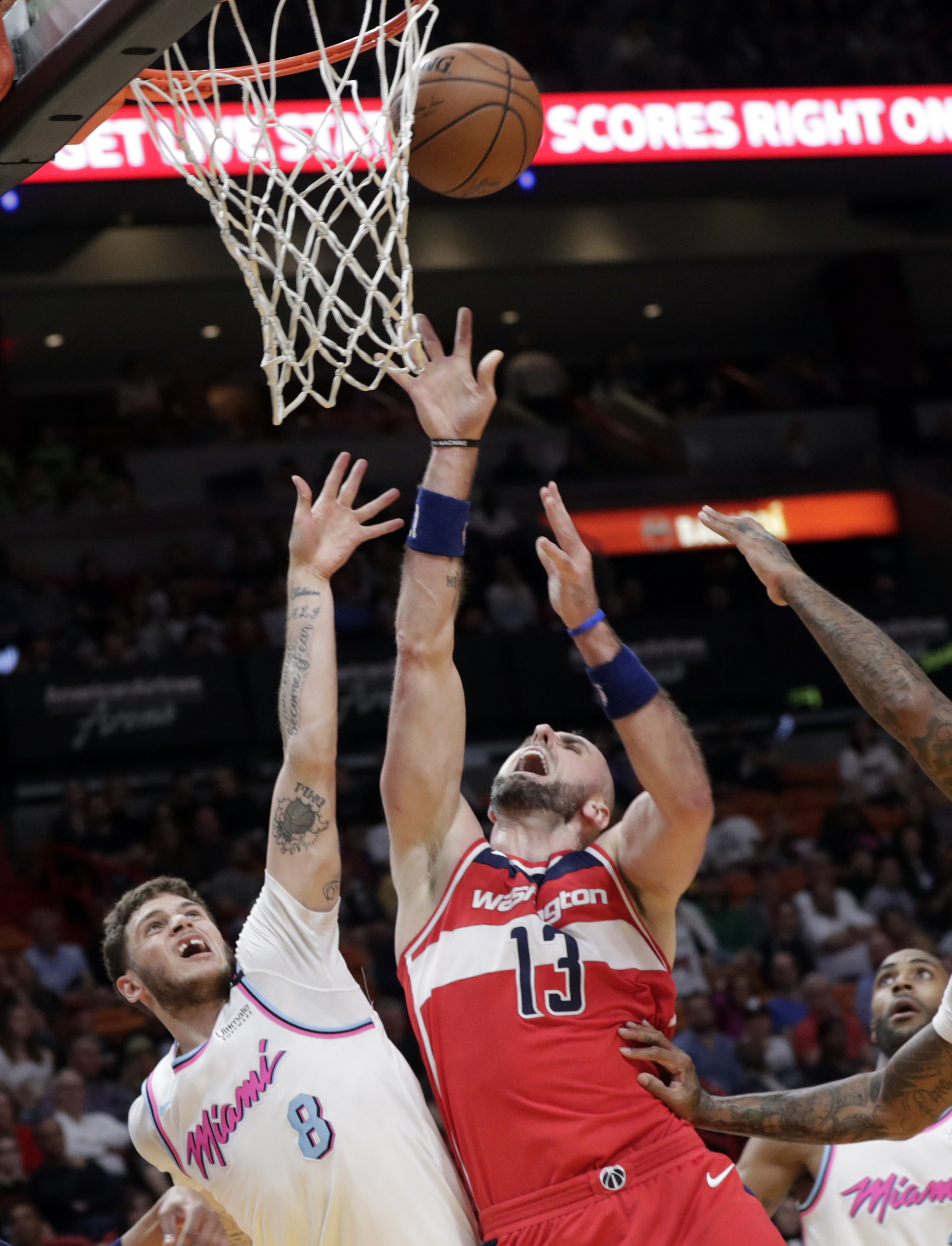 Wade hurt, but Heat roll past Wizards 129-102