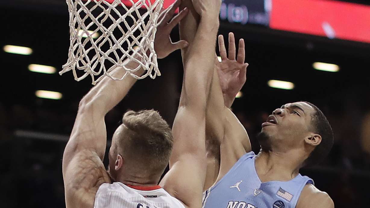 No. 1 Virginia wins ACC title, 71-63 over No. 12 NCarolina