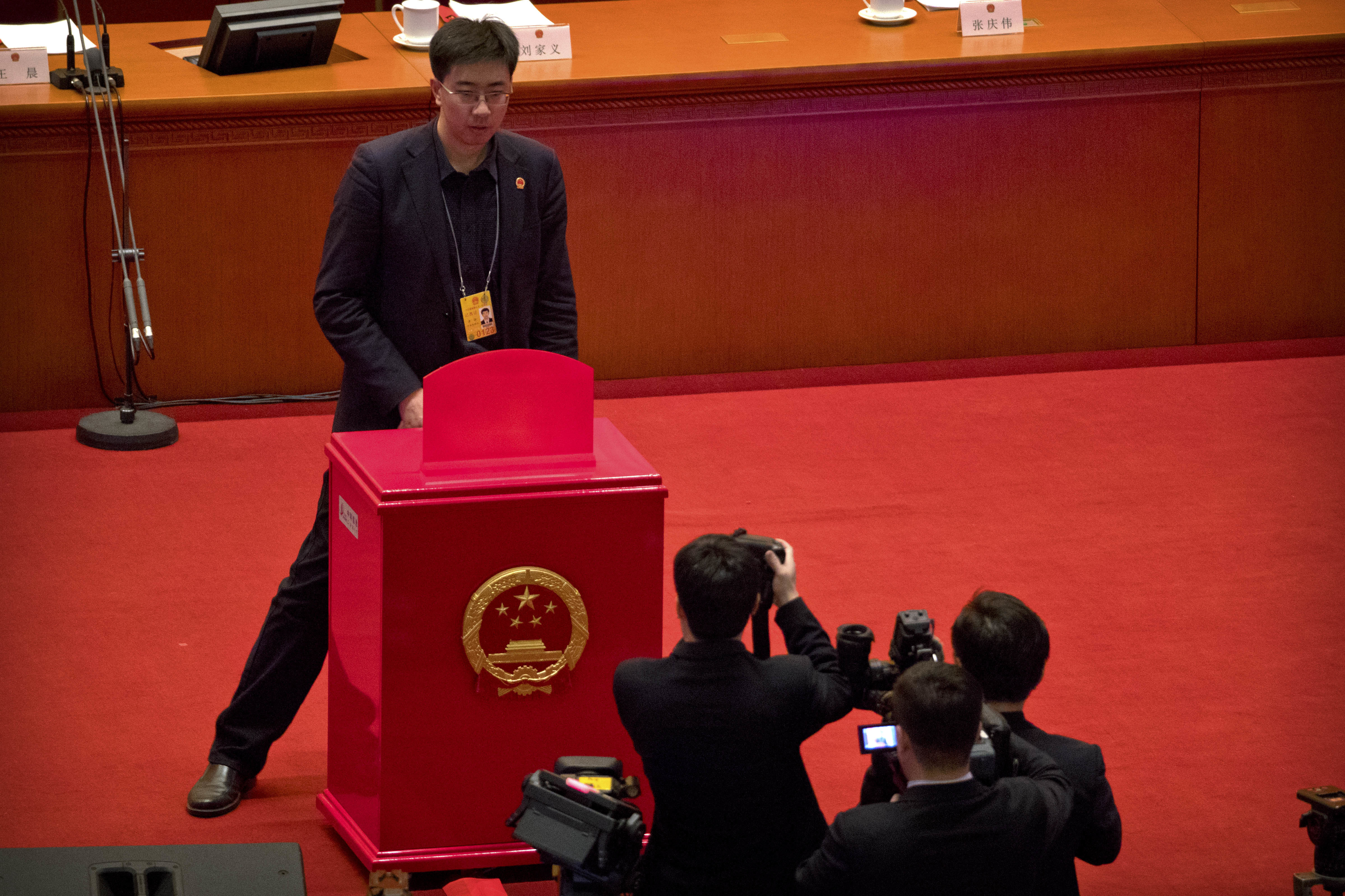 The Latest: China lawmakers abolish presidential term limits