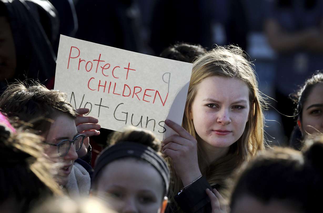 In this Feb. 28, 2018 photo, Somerville High School junior Megan Barnes marches with others during a student walkout at the school in Somerville, Mass. A large-scale, coordinated demonstration is planned for Wednesday, March 14, when organizers have called for a 17-minute school walkout nationwide to protest gun violence. (Photo: Craig F. Walker/The Boston Globe via AP)