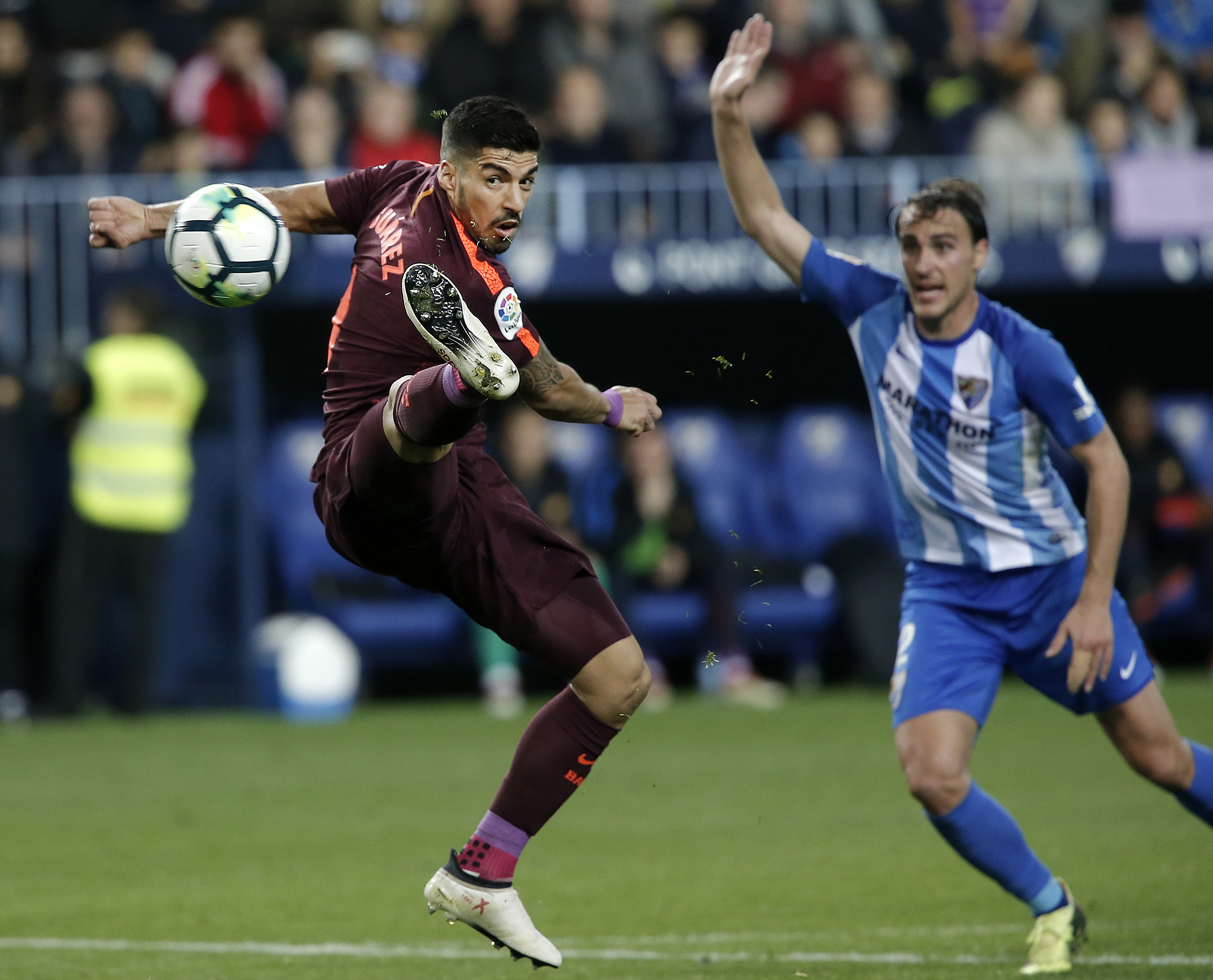 Griezmann thrives as Atletico stays 8 points behind Barca