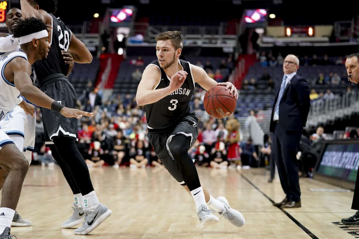 Davidson guard Jon Axel Gudmundsson (3) drives during the first half of an NCAA college basketball championship game in the Atlantic 10 Conference tournament, Sunday, March 11, 2018, in Washington. (AP Photo, Andrew Harnik)