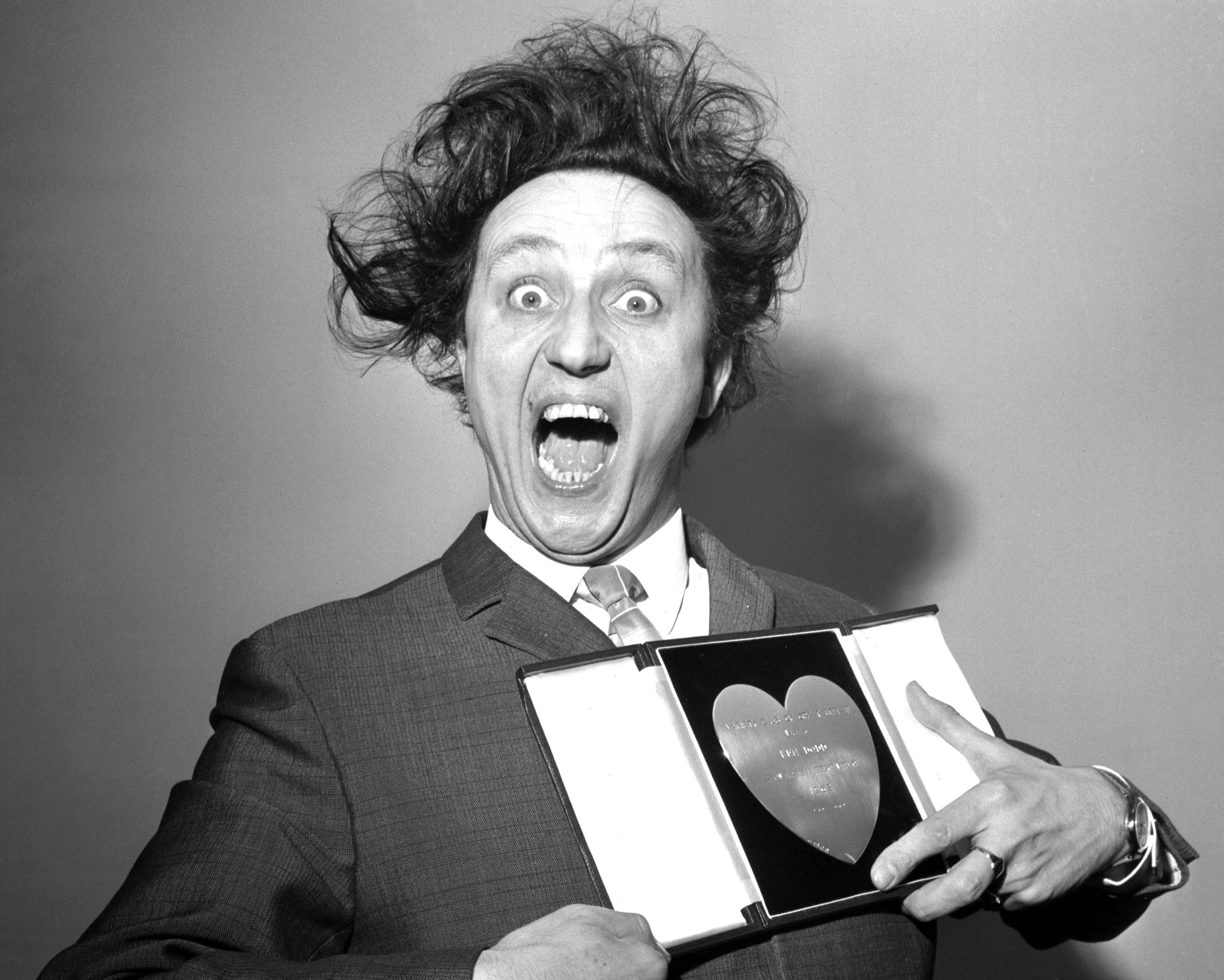 Comic Ken Dodd, whose fame rivaled The Beatles, dies at 90