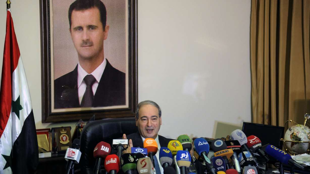 The Latest: Syria opposition urges force imposing cease-fire