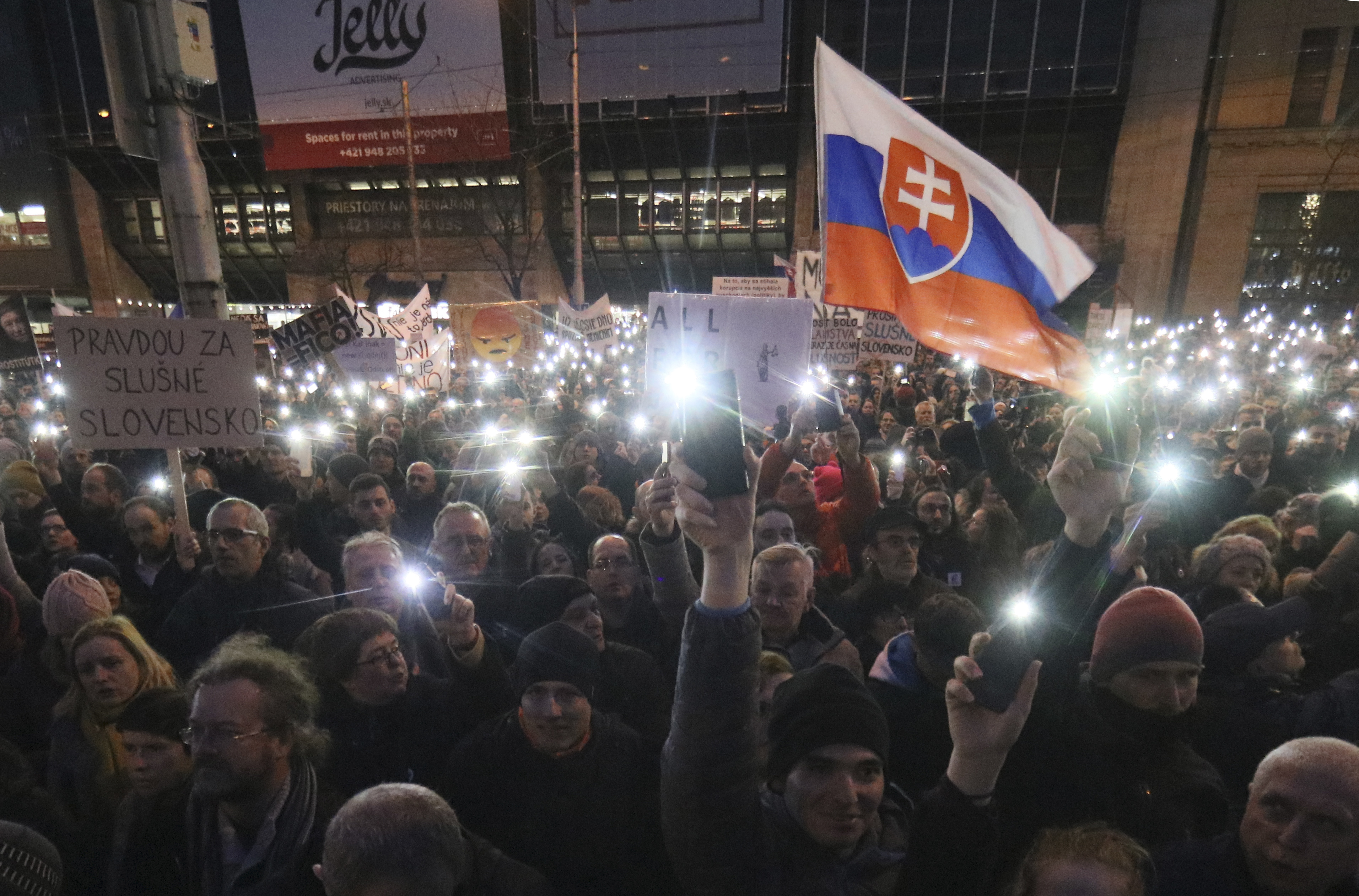 The Latest: Slovak party demands new election over slaying