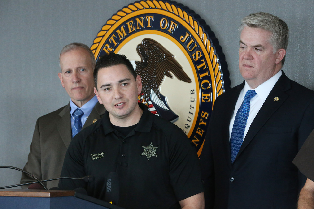 Utah Department of Public Safety Commissioner Keith Squires, left, and U.S. Attorney for Utah John Huber, right, listen as Department of Public Safety Capt. Jared Garcia answers a question during a press conference announcing the indictment of James Musa Gama during a press conference in Salt Lake City on Monday, March 12, 2018. Gama faces federal drug trafficking and firearms charges. Huber said federal authorities are taking an active role in the crackdown on drug trafficking and gun violence in Pioneer Park as part of Operation Rio Grande. (Photo: Scott G Winterton,