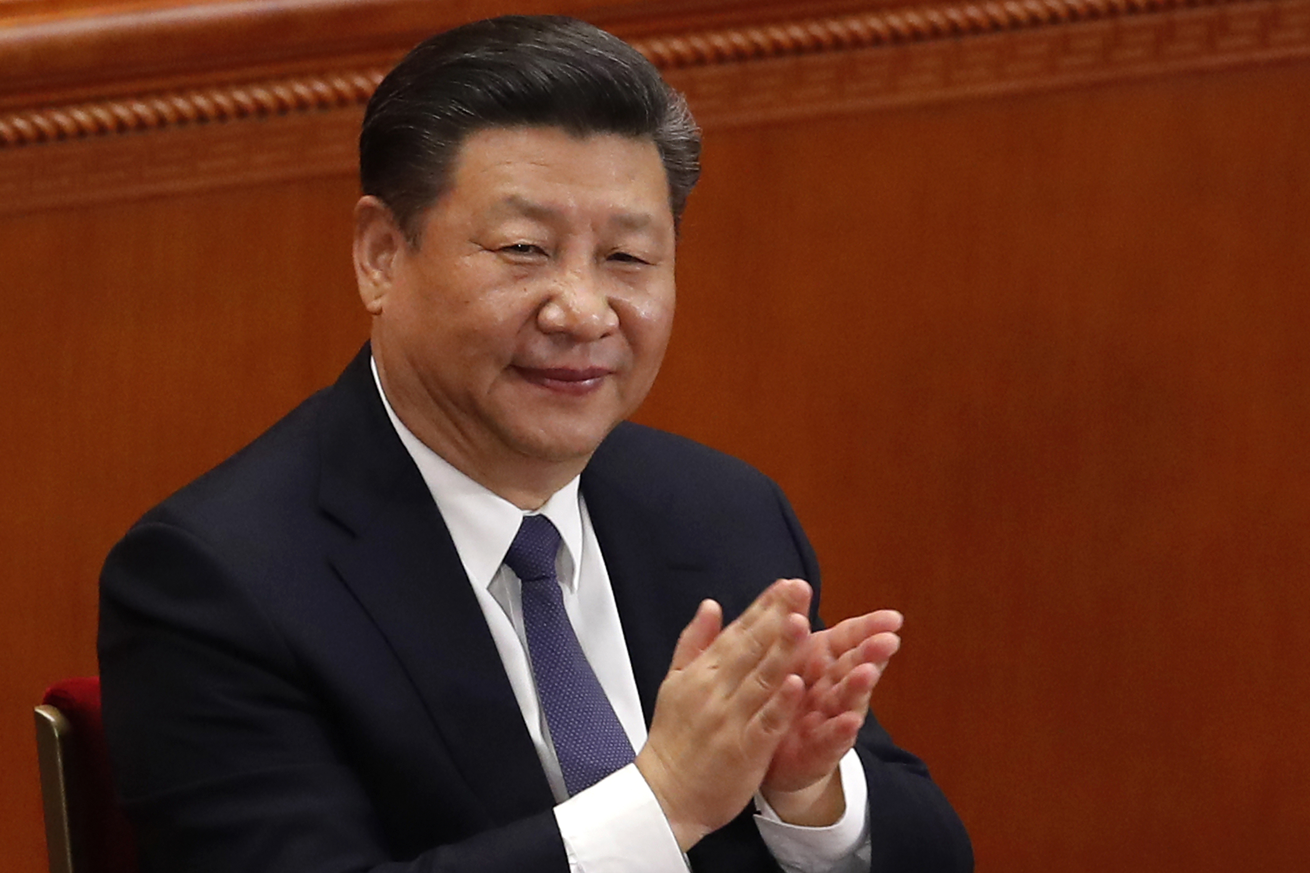 No term limit could allow Xi to be bold on Hong Kong, Taiwan