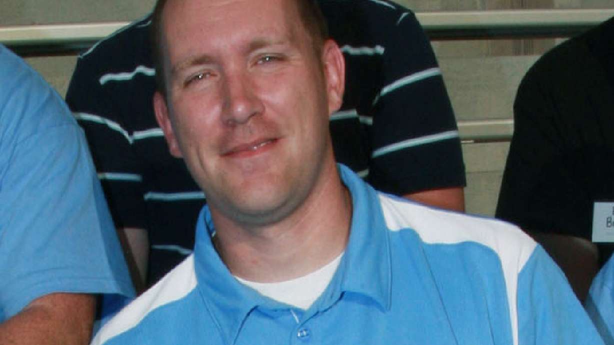 The Latest: Coach jailed after recording players disrobing