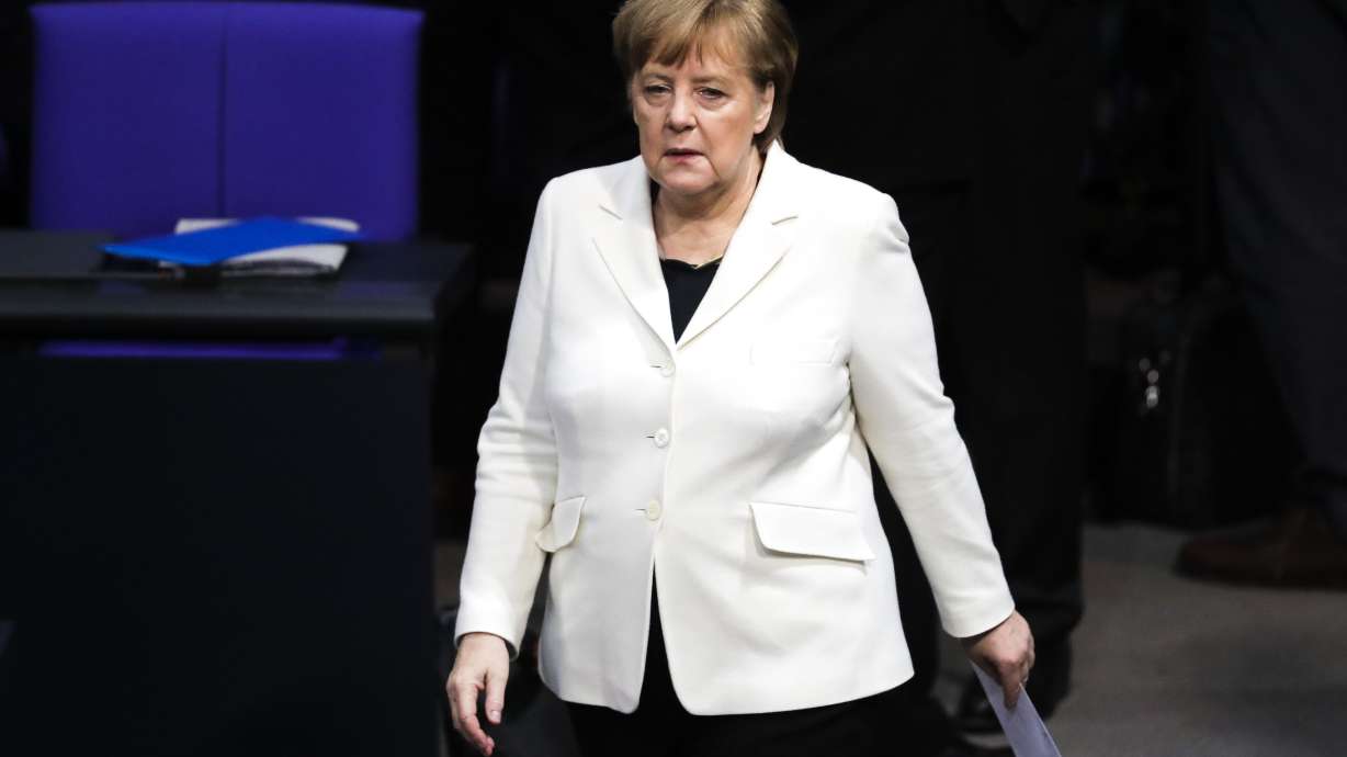 The Latest: President says much is expected of Germany