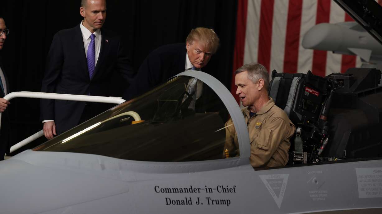 The Latest: Trump checks out fighter jets at Boeing plant
