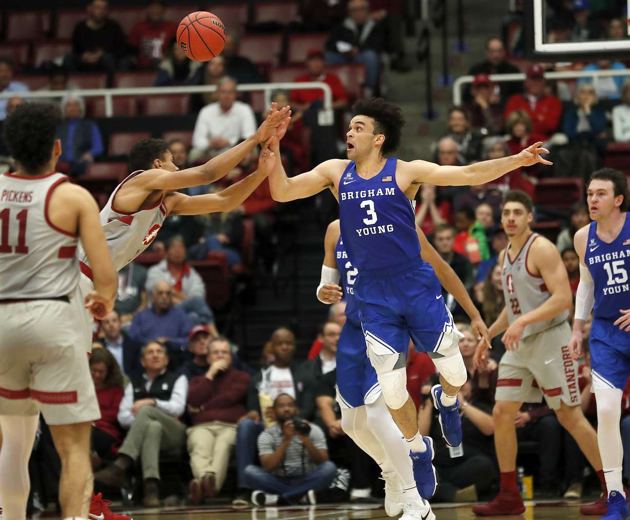BYU guard Elijah Bryant (3) steals the ball from Stanford forward Oscar da Silva (13) during the second half of an NCAA college basketball game in the first round of the NIT, Wednesday, March 14, 2018, in Stanford, Calif. (AP Photo, Tony Avelar)