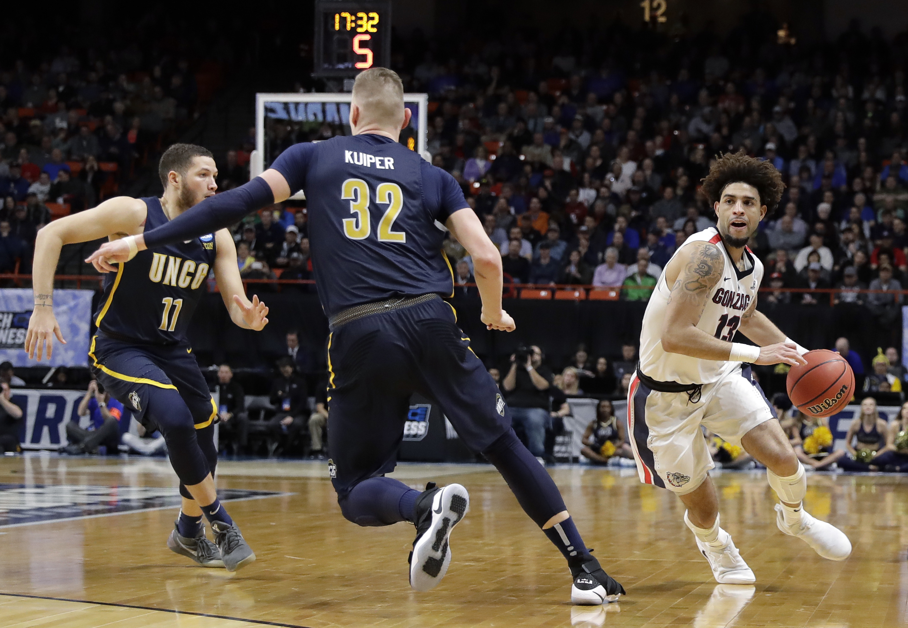 Norvell Jr. makes key 3 to help Gonzaga escape UNCG 68-64