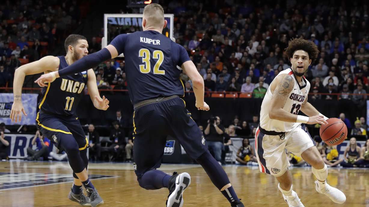 Norvell Jr. makes key 3 to help Gonzaga escape UNCG 68-64