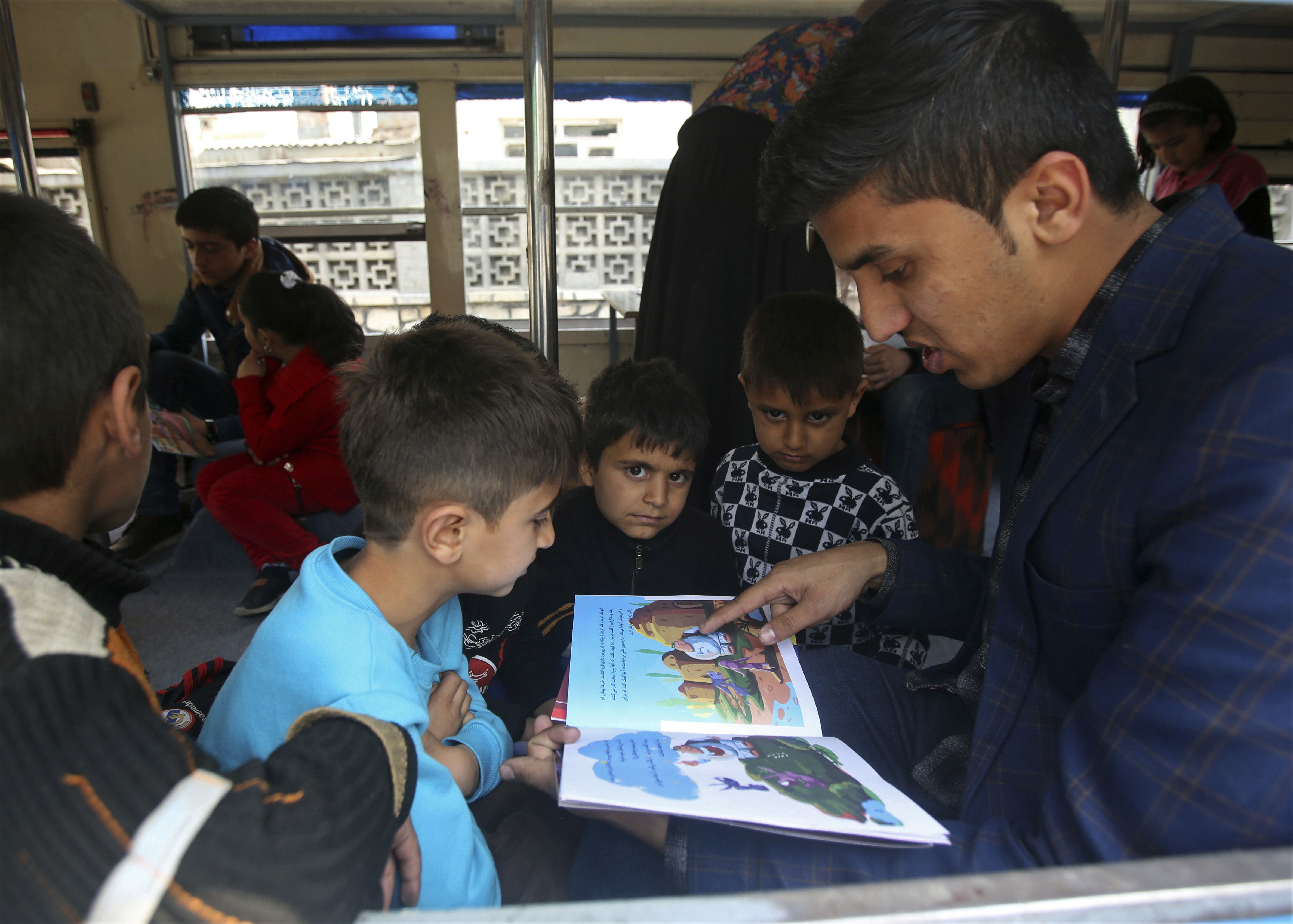 Library on wheels brings joy of books to Afghan kids