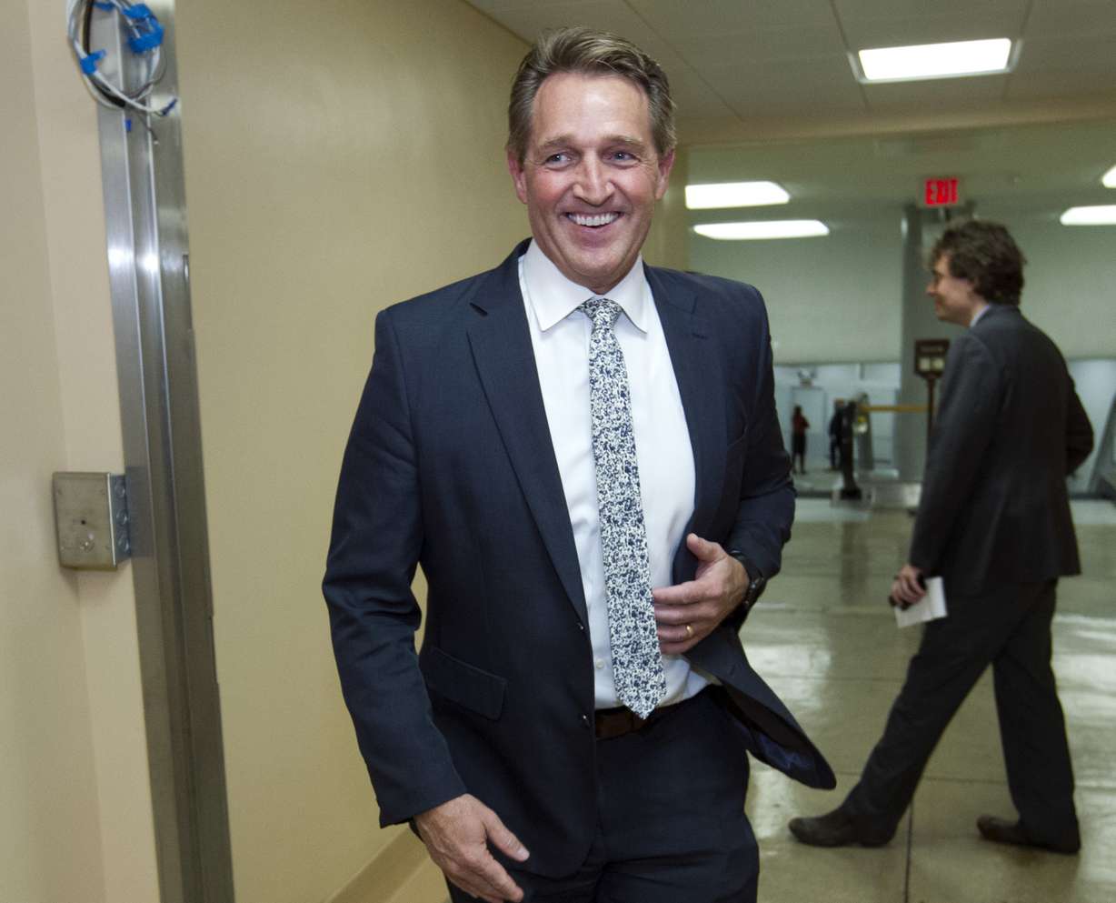 FILE - In this Feb. 9, 2018, file photo, Sen. Jeff Flake, R-Ariz., walks to the senate chamber for early morning votes at Capitol Hill in Washington. Photo: Jose Luis Magala, AP Photo