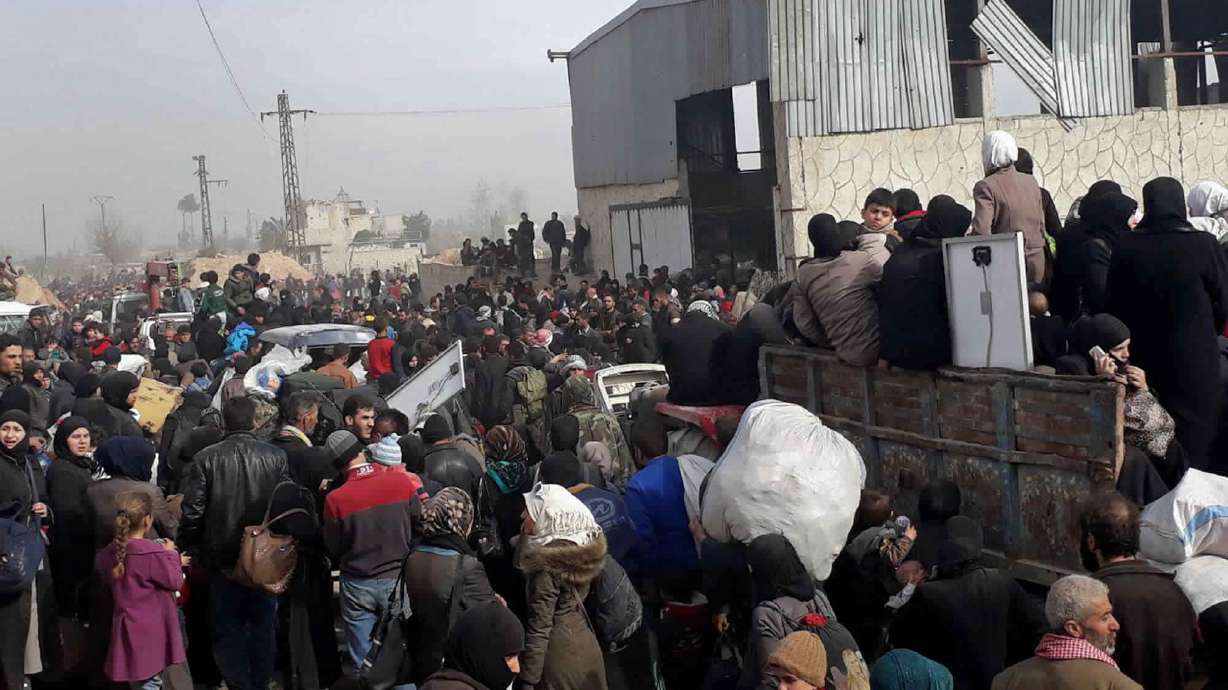 In Syria, at least 100 killed in attacks as more people flee