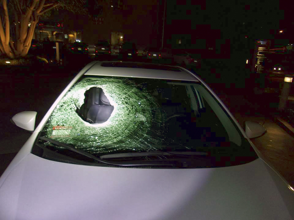 Boulder pushed off California overpass kills car passenger