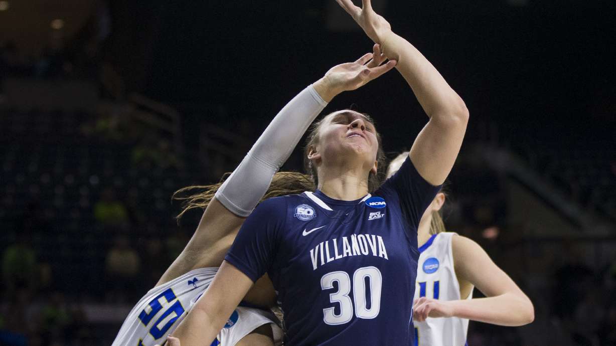 Hahn, Tucker 3-pointers lead Wildcats in overtime