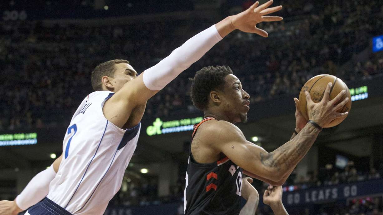 DeRozan has 29, Raptors win 11th straight, beat Mavs 122-115