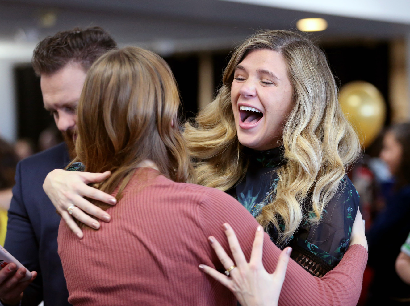 Grace Brummer celebrates with Marlayna Despres as fourth-year medical students find out where they will conduct their residencies at a reception in the Tower at Rice-Eccles Stadium in Salt Lake City on Friday, March 16, 2018. (Photo: Scott G Winterton, KSL)