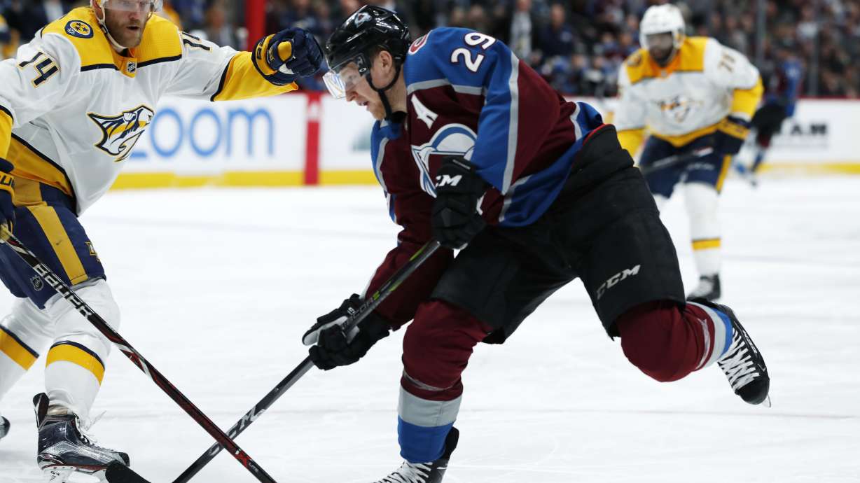 Predators clinch playoff spot with 4-2 win over Avalanche