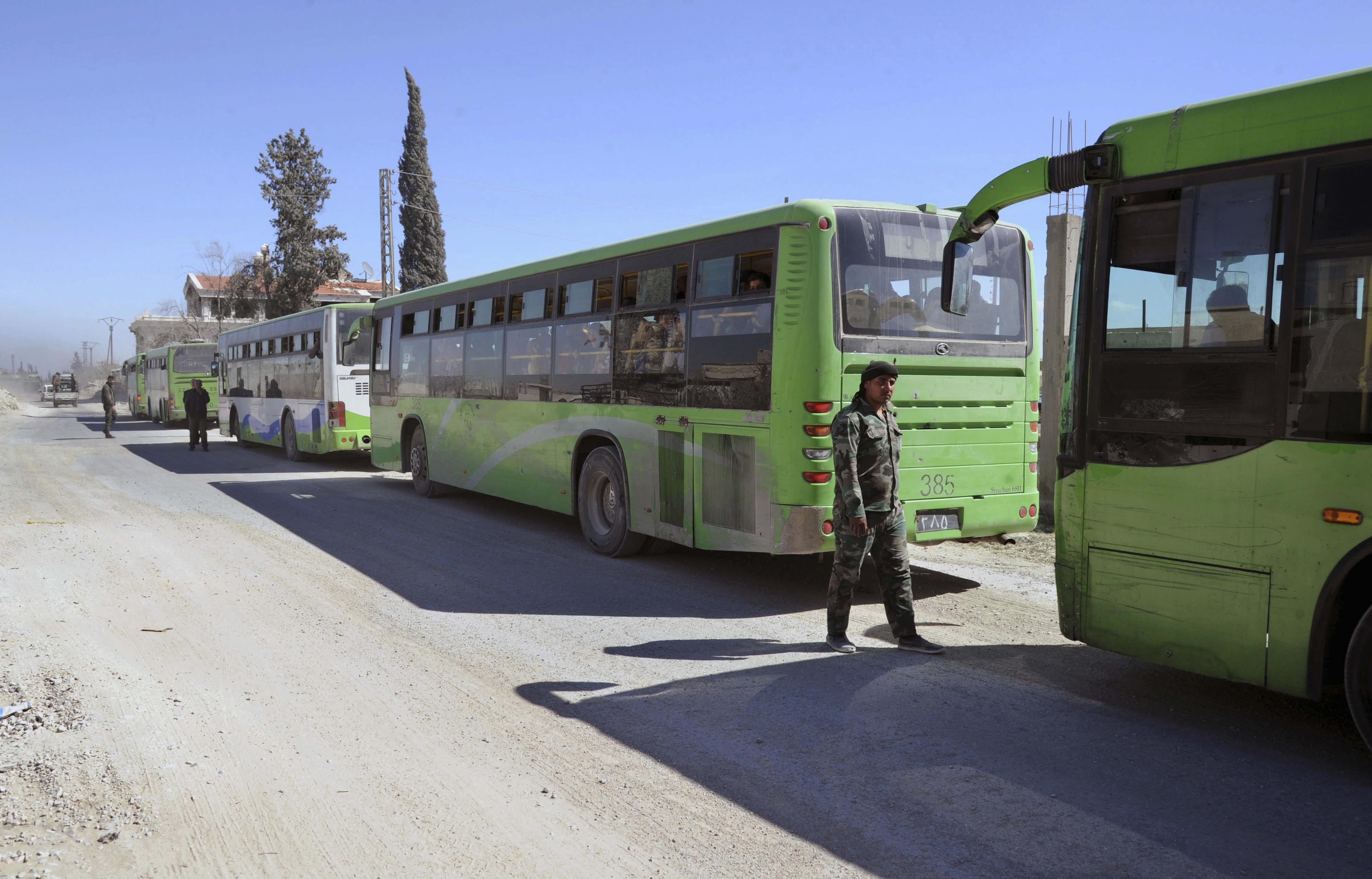 The Latest: Russia says 30,000 flea besieged east Ghouta