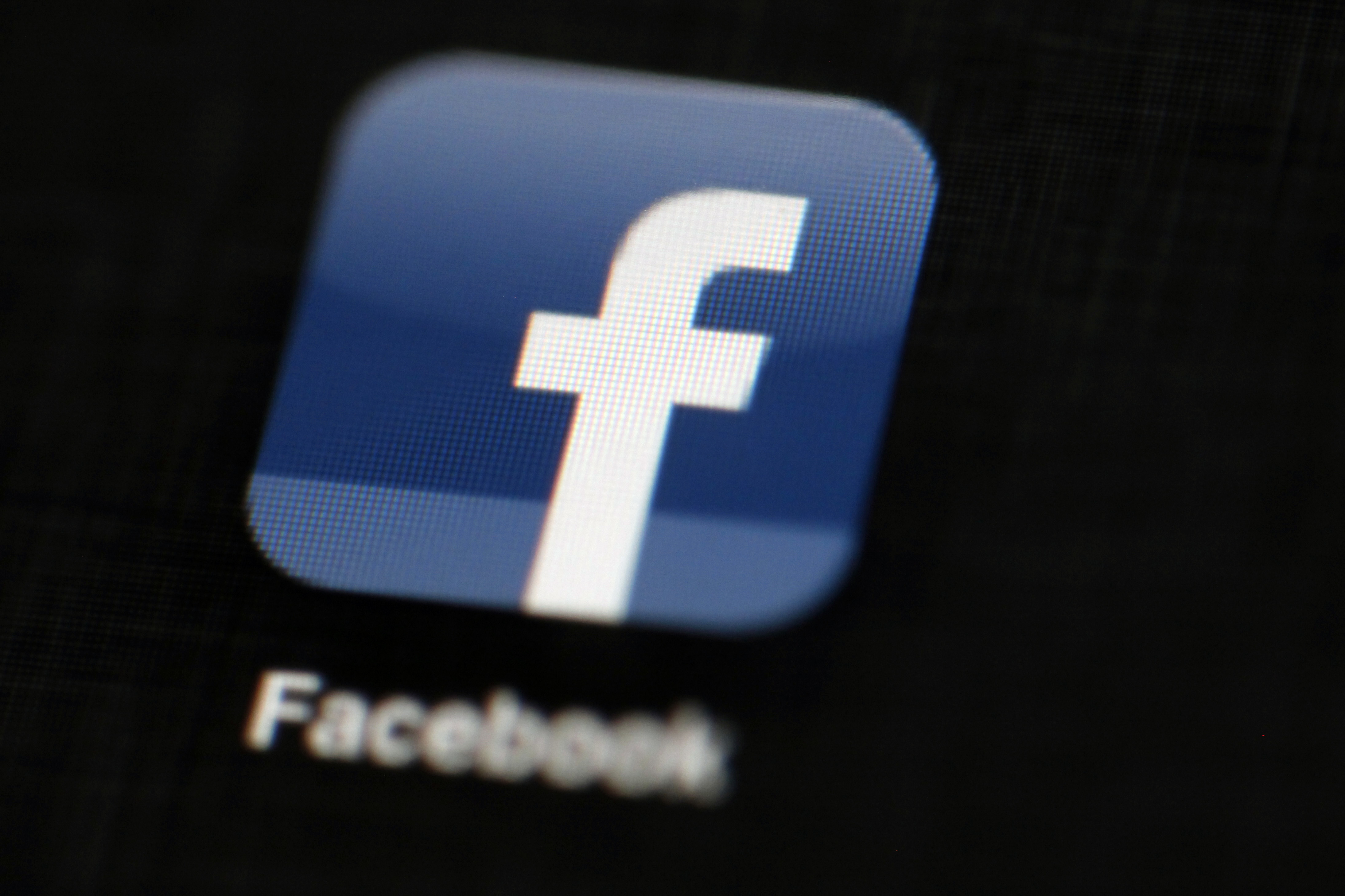 UK probing Facebook after Cambridge Analytica suspension