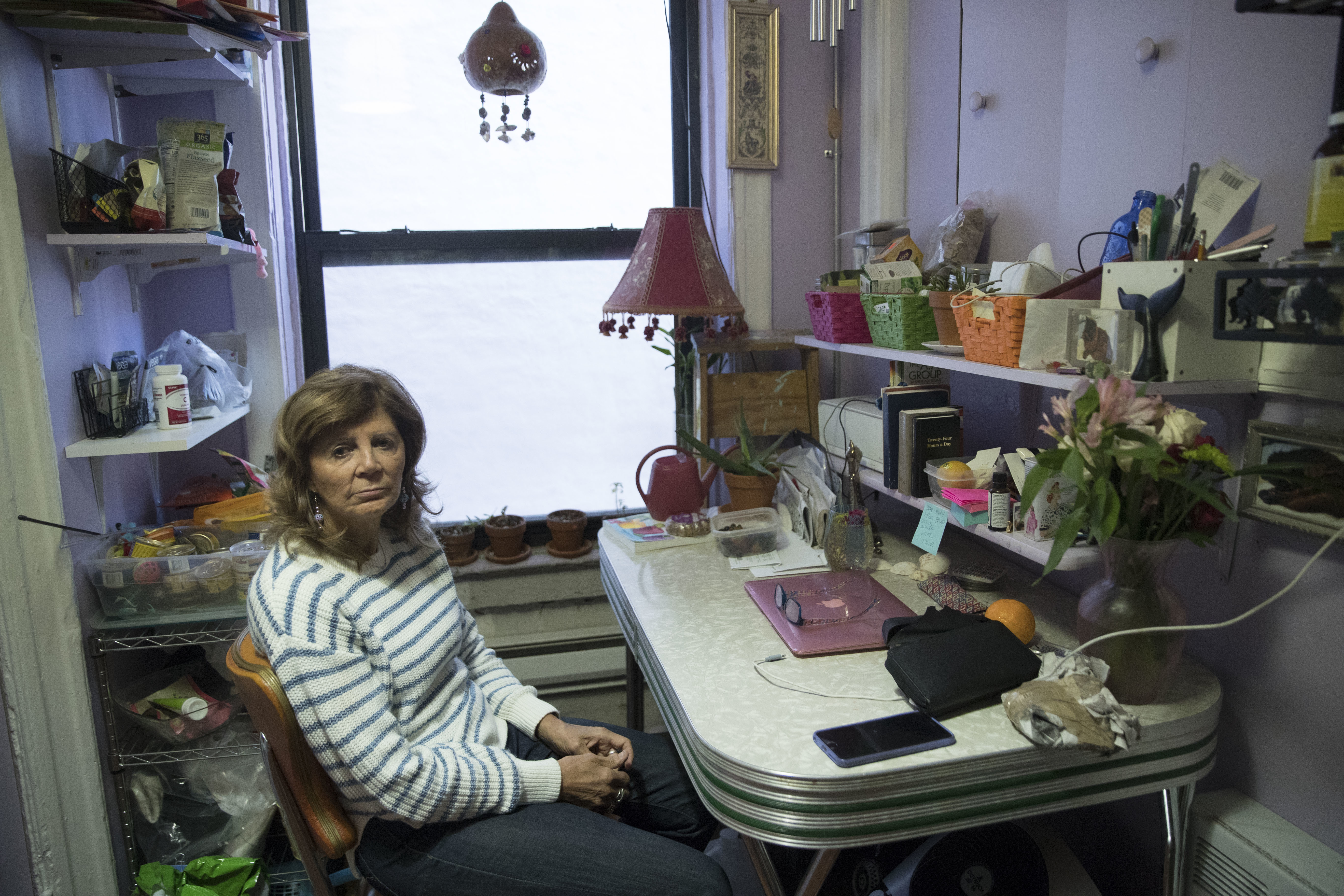 In this March 15 photo, Mary Ann Siwek sits in her apartment in the East Village neighborhood of Manhattan. Jared Kushner’s family real estate company routinely filed false documents with New York City claiming it had no rent-regulated tenants in its buildings, including the one where Siwek lived, when it actually had hundreds. (Photo: Mary Altaffer, AP)