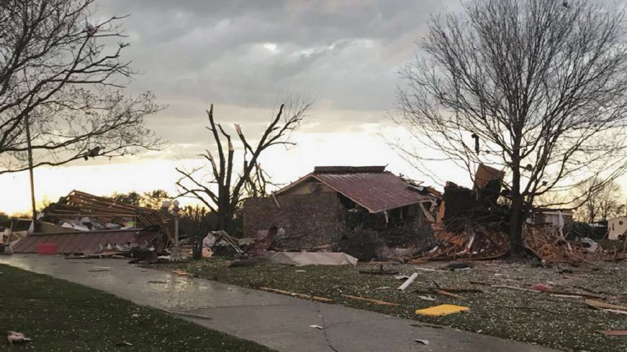 The Latest: Tampa airport: dozens of delays from storms