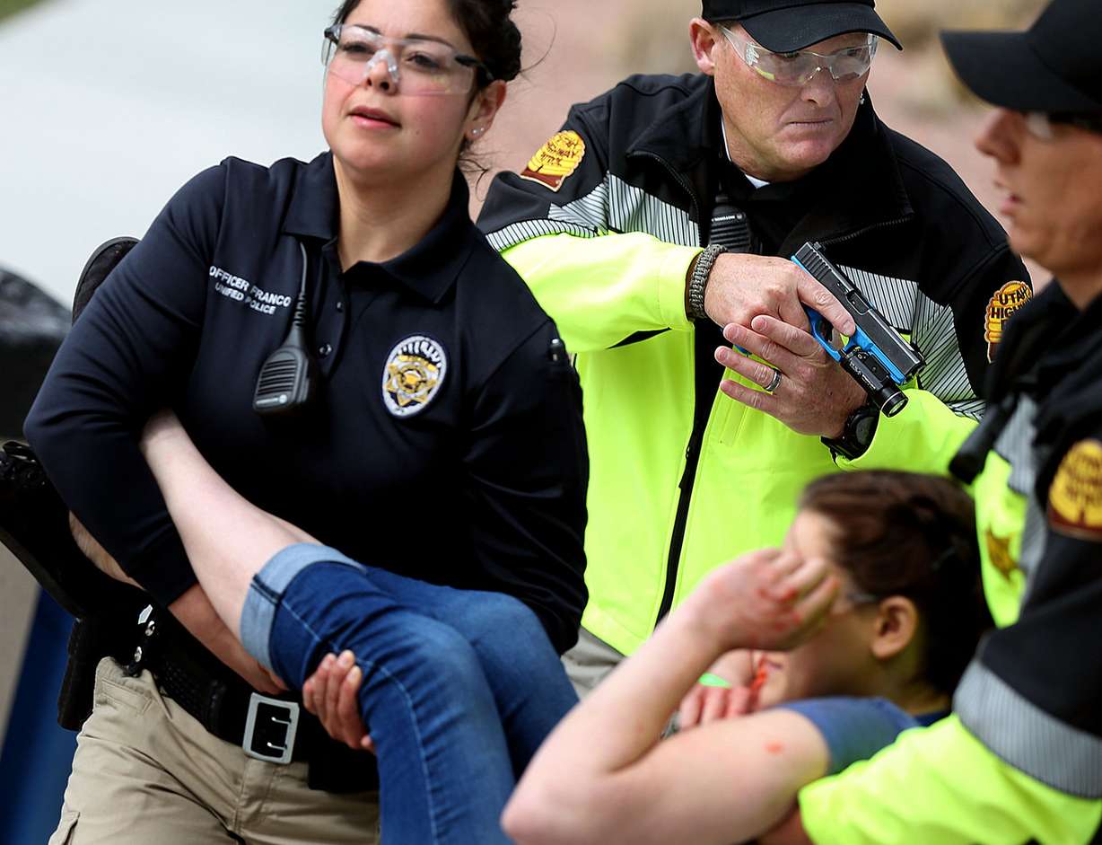 Officers with multiple law enforcement agencies participate in a public safety drill at Salt Lake Community College’s Taylorsville Redwood Campus in Salt Lake City on Thursday, March 22, 2018. (Photo: Laura Seitz, KSL)