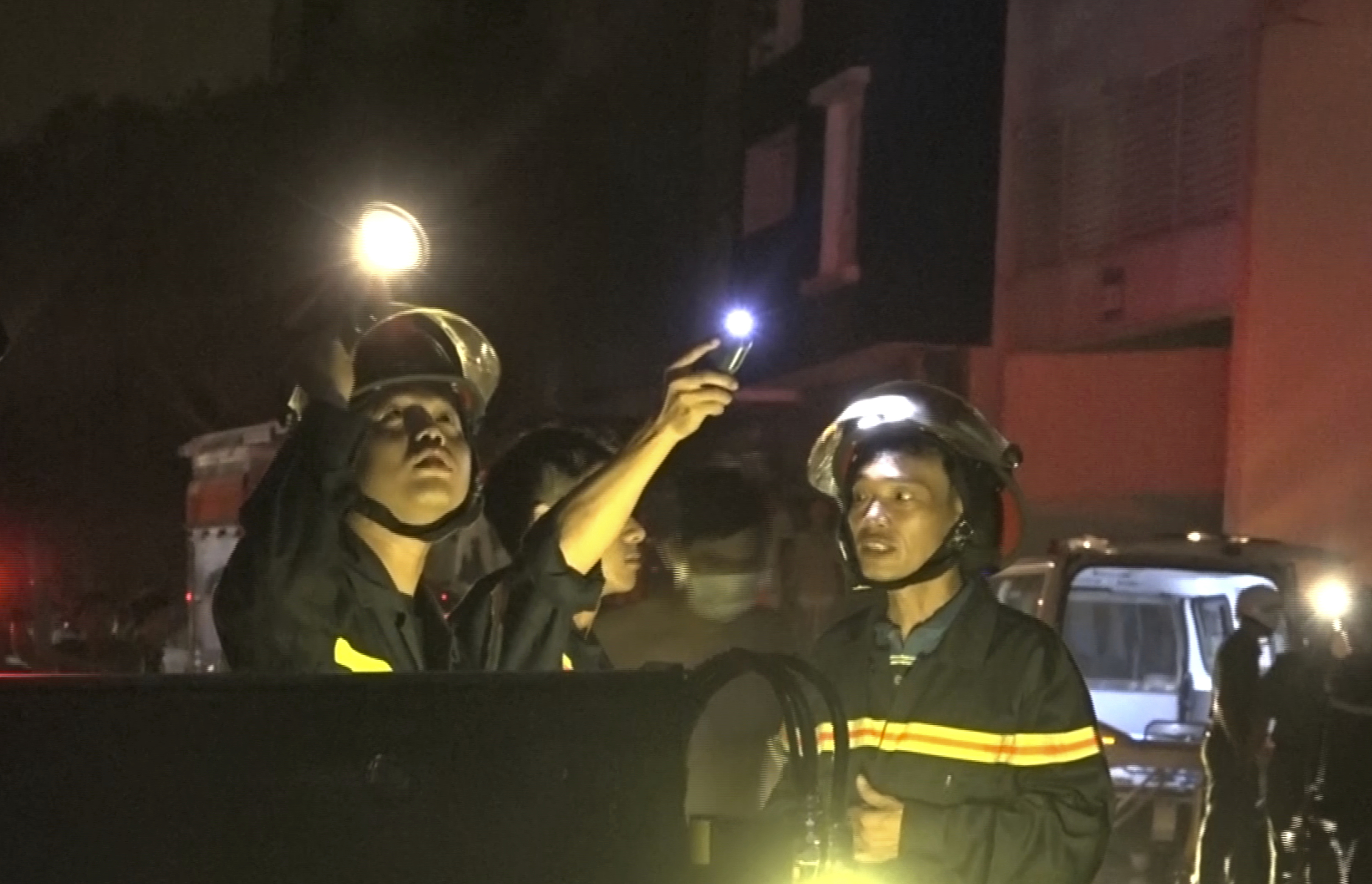 The Latest: Fire alarm wasn't heard inside Vietnam condos