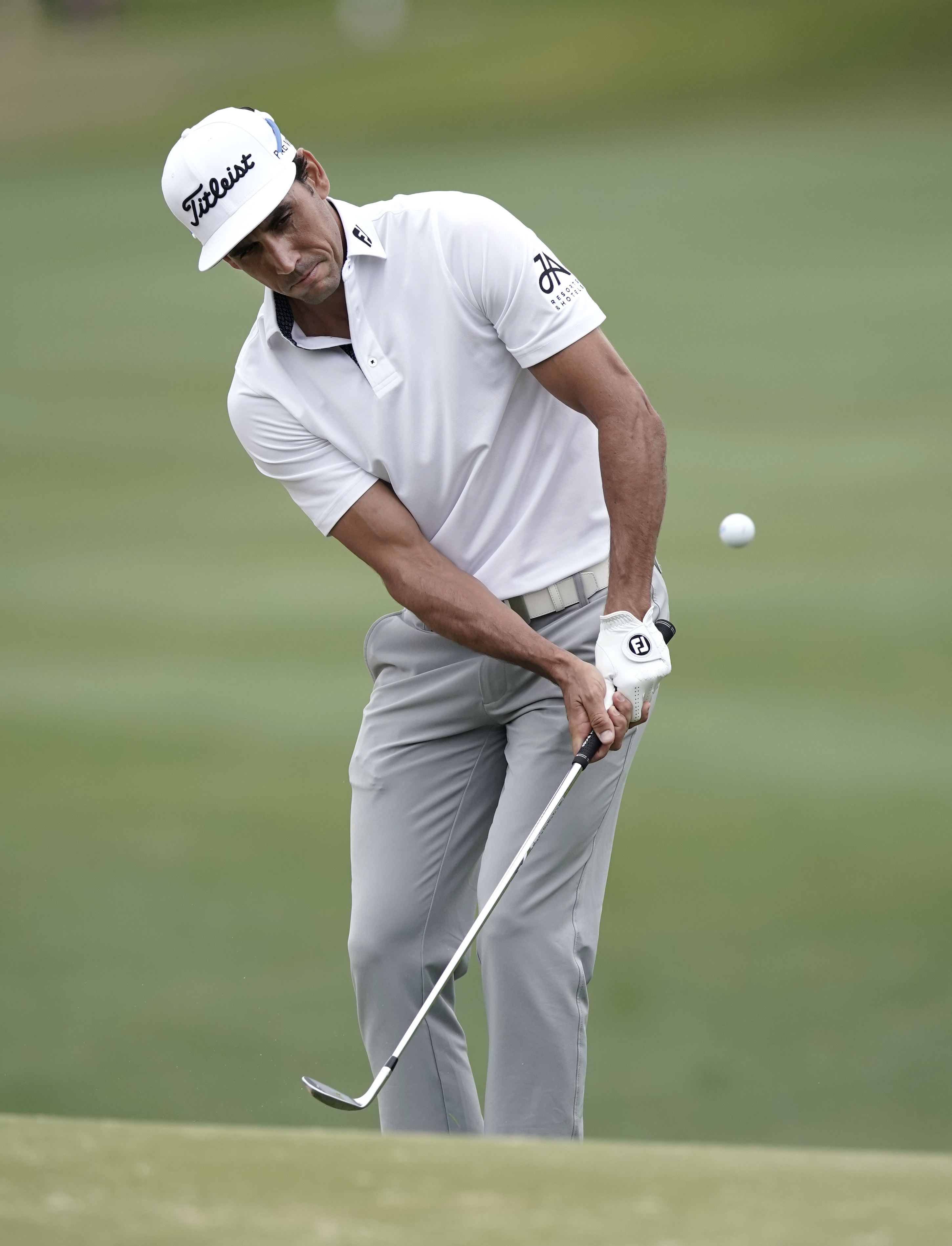 The Latest: Reed finishes off Spieth with 40-foot birdie