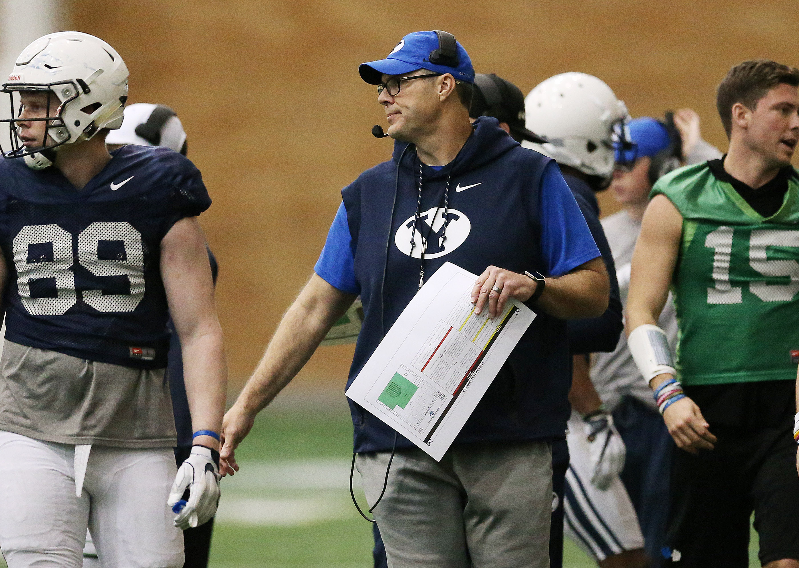 BYU offensive coordinator Jeff Grimes watches action during an intersquad scrimmage in Provo on Friday, March 23, 2018.