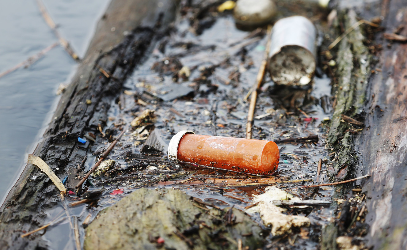 Trash collects in a boom floating on the Jordan River in North Salt Lake on Monday, March 26, 2018. (Photo: Scott G Winterton, KSL)