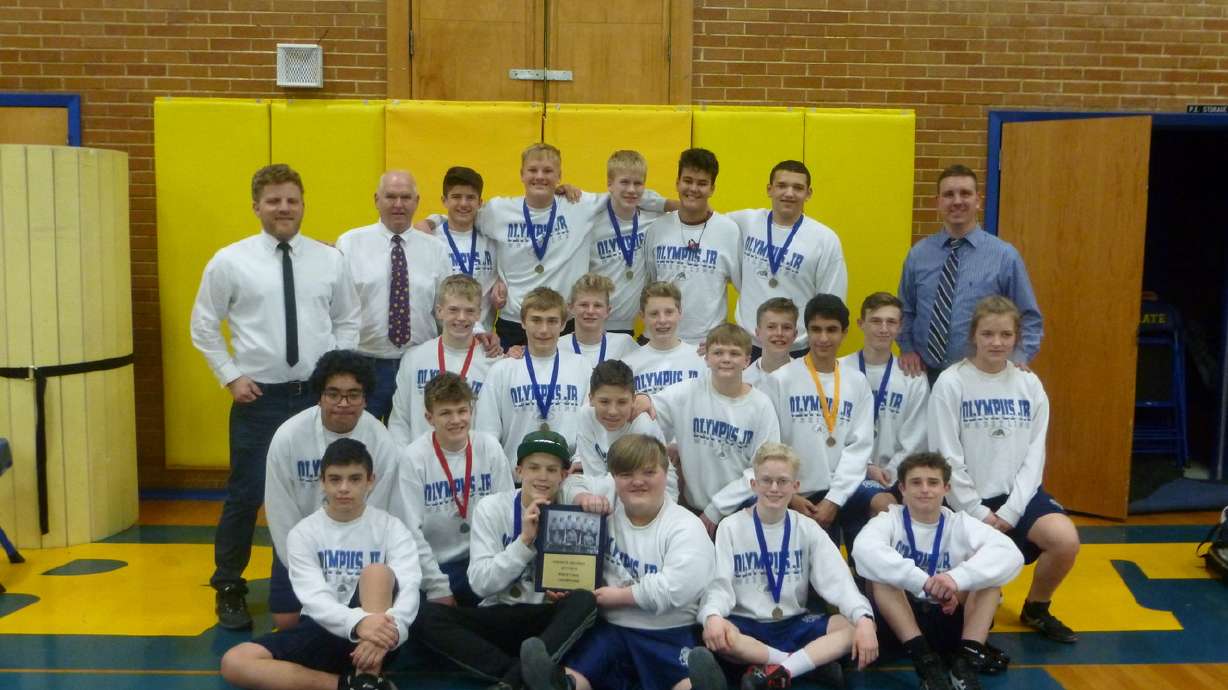 Keeping 20-year streak alive, Olympus Junior High wrestling team again wins district title