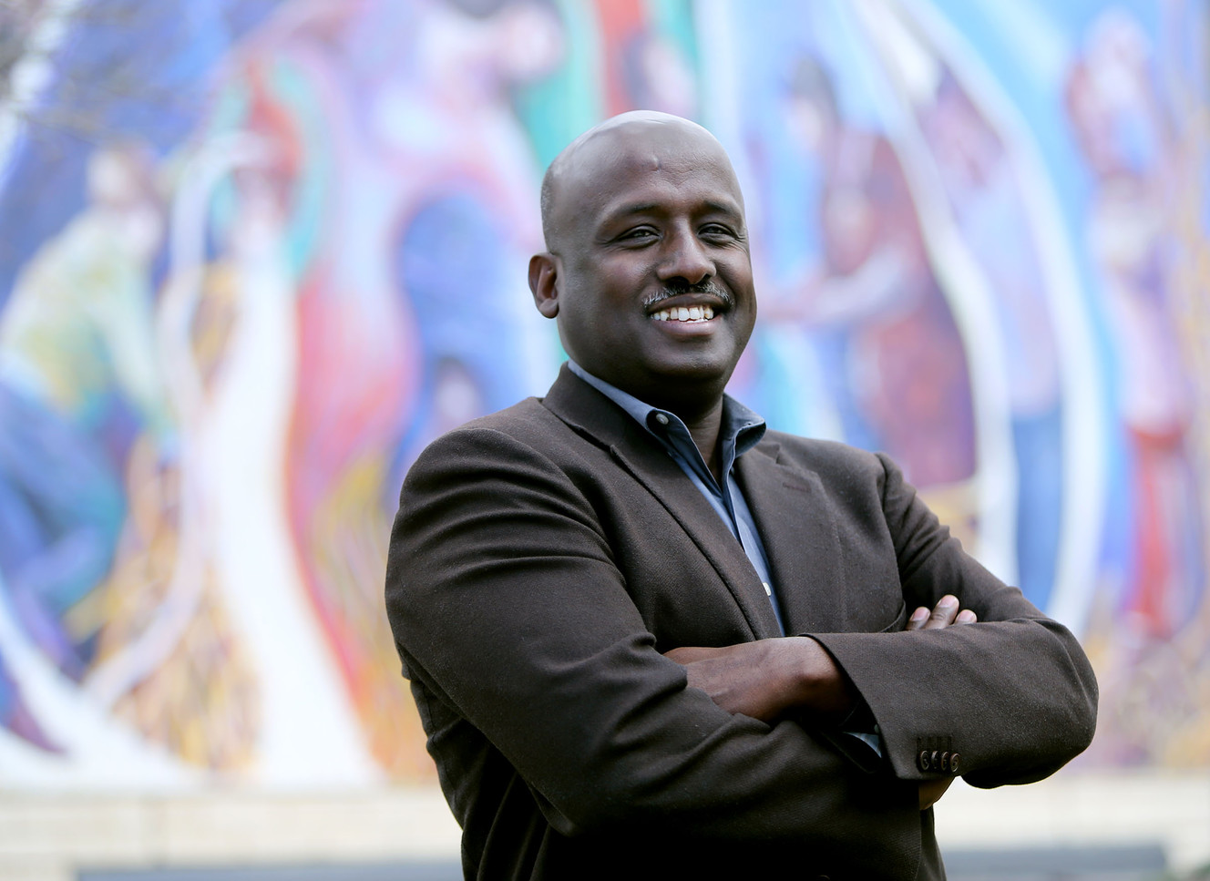 Aden Batar, director of immigration and refugee resettlement for Catholic Community Services, poses for a photo at the organization's offices in Salt Lake City on Wednesday, March 28, 2018. (Photo: Kristin Murphy, KSL)