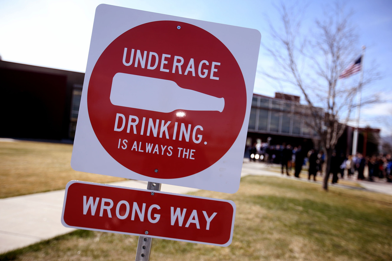 Signs discouraging underage drinking are pictured at the drop-off and pickup zones at Willow Creek Middle School in Lehi on Thursday, March 29, 2018. (Photo: Laura Seitz, KSL)