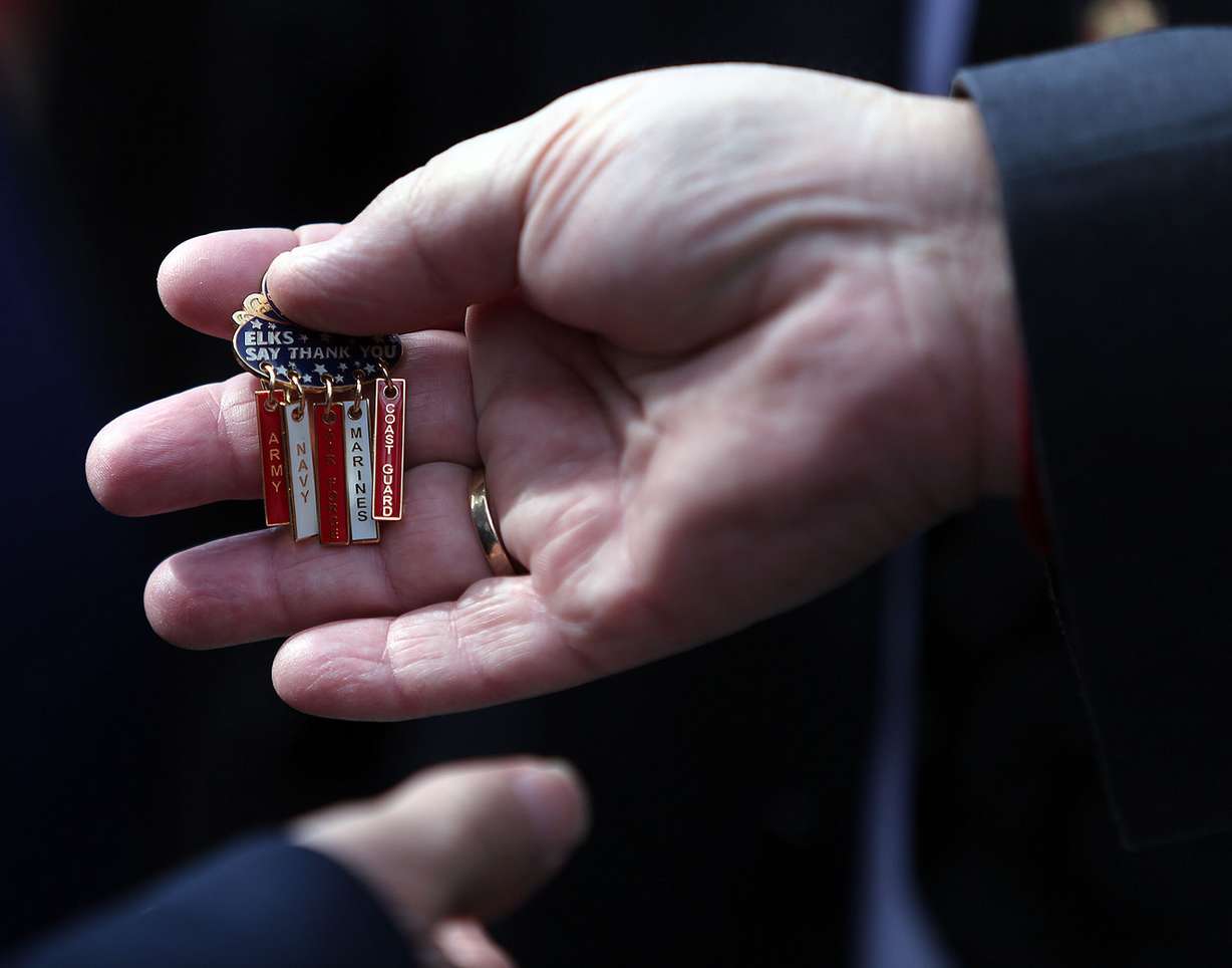 A veteran is given an Elks Say Thank You pin at the Vietnam Veterans Remembrance Day ceremony outside the Capitol in Salt Lake City on Thursday, March 29, 2018. (Photo: Kristin Murphy, KSL)
