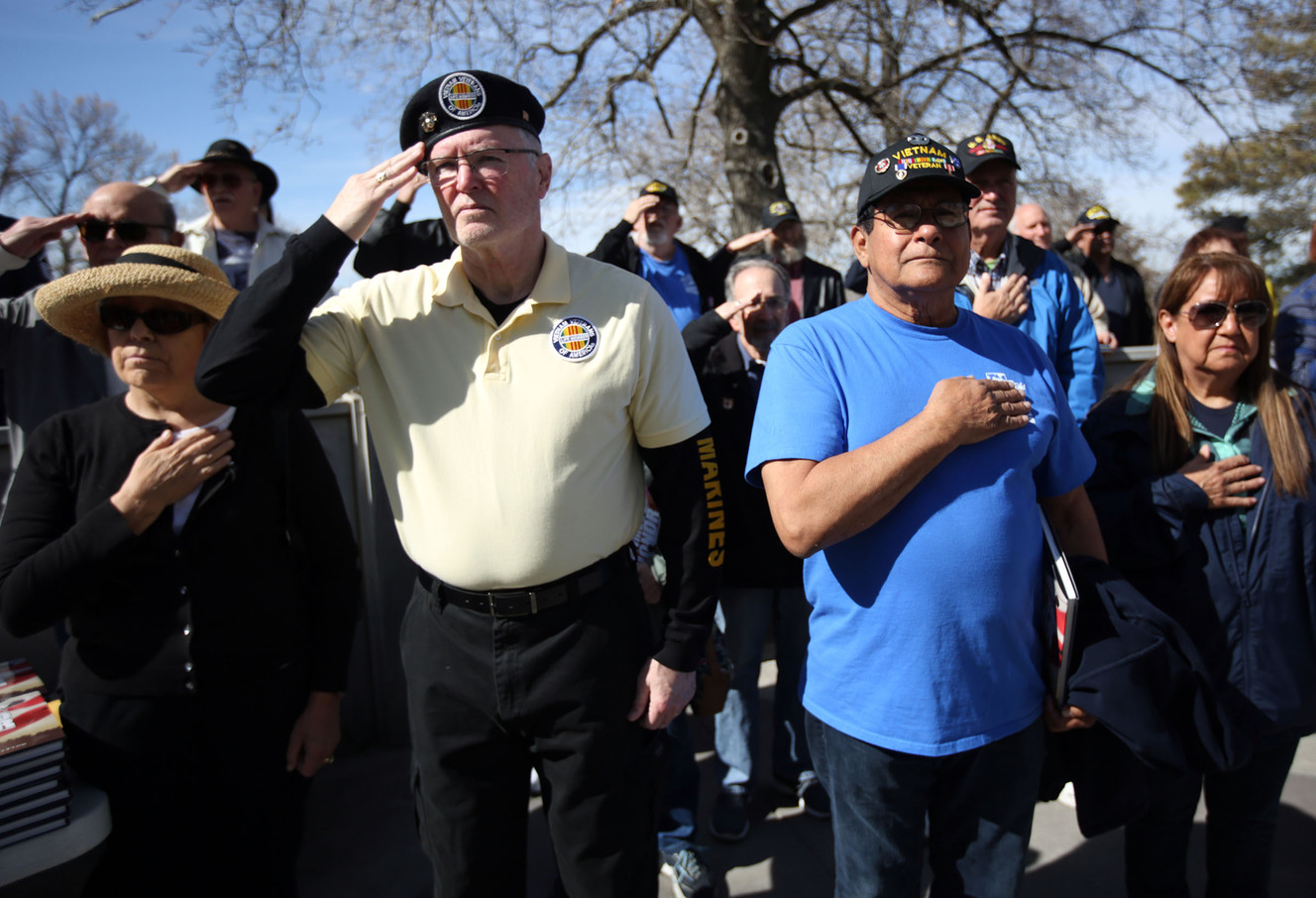 Veterans and participants salute and hold their hands over their hearts as the national anthem is played during the Vietnam Veterans Remembrance Day ceremony outside the Capitol in Salt Lake City on Thursday, March 29, 2018. (Photo: Kristin Murphy, KSL)