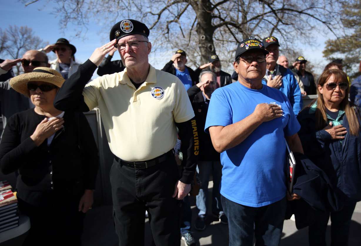 Veterans and participants salute and hold their hands over their hearts as the national anthem is played during the Vietnam Veterans Remembrance Day ceremony outside the Capitol in Salt Lake City on Thursday, March 29, 2018. (Photo: Kristin Murphy, KSL)