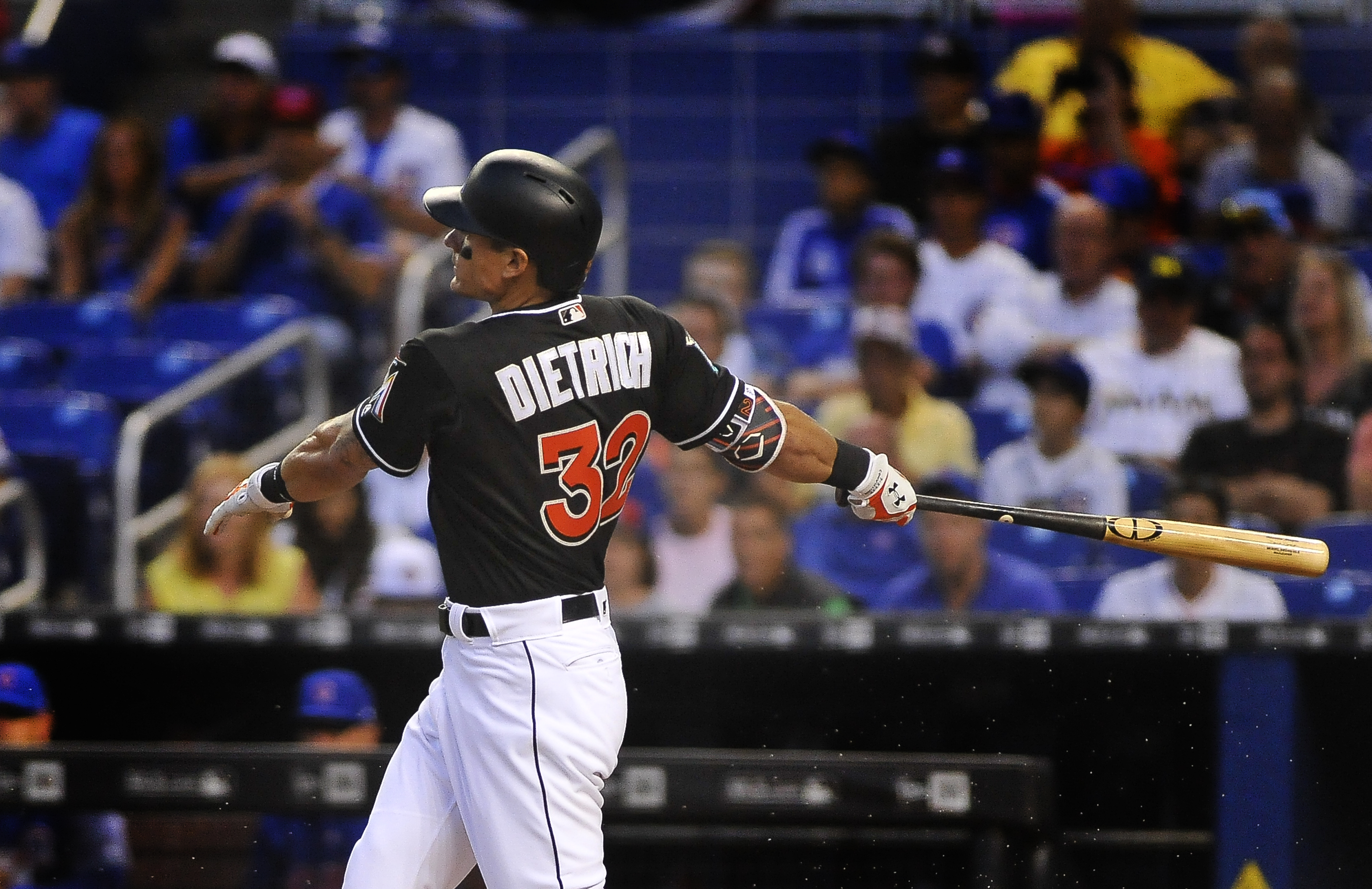 Bryant's 3-run double in 10th helps Cubs beat Marlins 10-6
