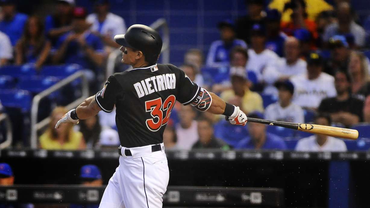 Bryant's 3-run double in 10th helps Cubs beat Marlins 10-6
