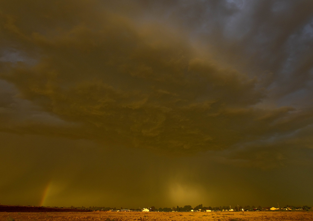 In this 2011 file photo, a dust storm also known as a haboob in Arabic and around Arizona hovers over Queen Creek, Ariz. Drought is tightening its grip across a wide swath of the American Southwest as farmers, ranchers and water managers throughout the region brace for what's expected to be more warm and dry weather through the spring. The federal drought map released Thursday, March 29, 2018, shows dry conditions intensifying across northern New Mexico and into southwestern Arizona. Every square mile of Nevada and Utah also are affected by at least some level of dryness. (AP Photo/Matt York, File)