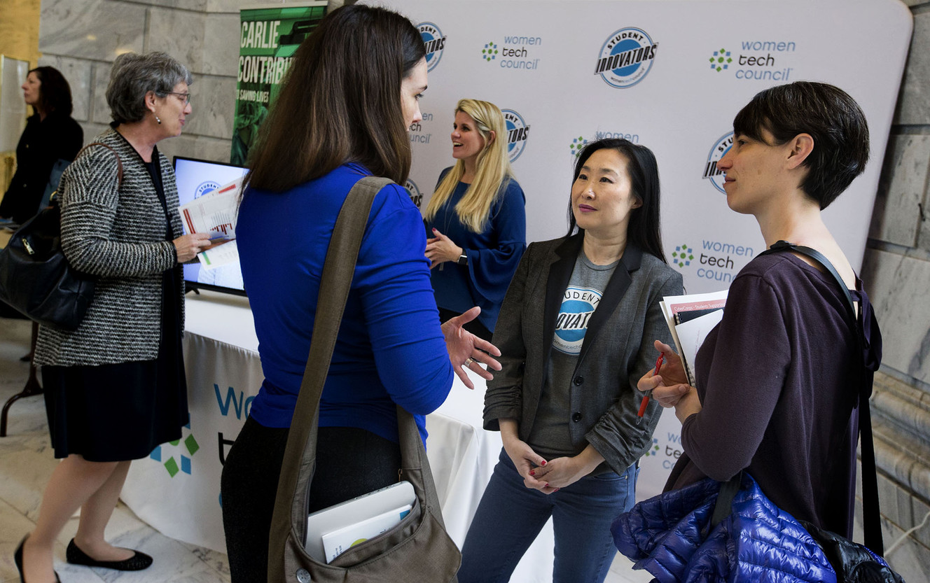 Emily Coonrod, of University of Utah Health, right, Sara Jones, of the Women Tech Council, and Amy Hawkins, of University of Utah Health, talk during a Talent Ready Utah event at the Capitol in Salt Lake City on Wednesday, March 21, 2018. (Photo: Laura Seitz, KSL)