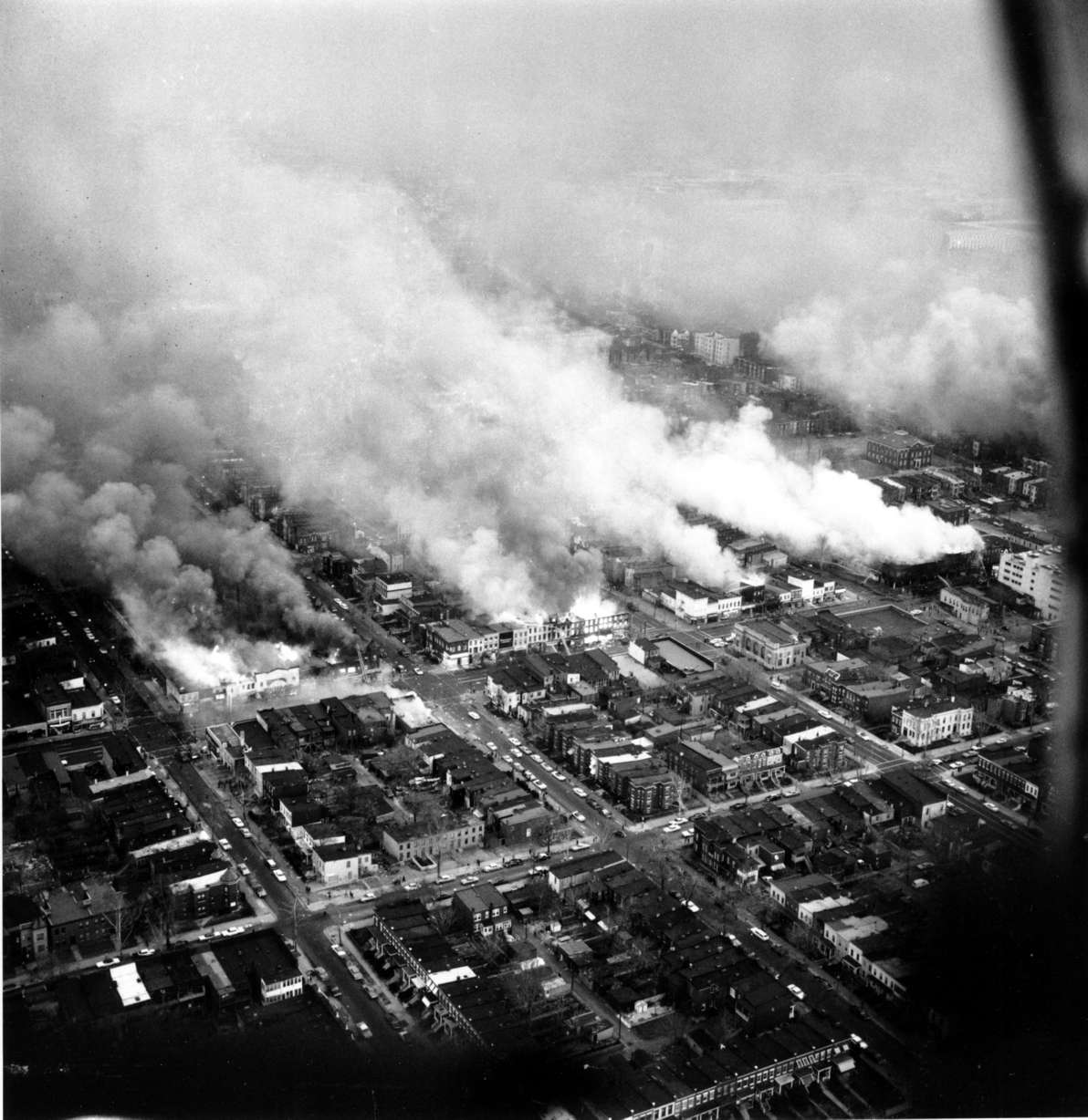 This aerial view shows clouds of smoke rising from burning buildings in northeast Washington, D.C. on April 5, 1968. The fires resulted from rioting and demonstrations after the assassination of Dr. Martin Luther King, Jr. in Memphis, Tenn. on April 4. (AP Photo, File)