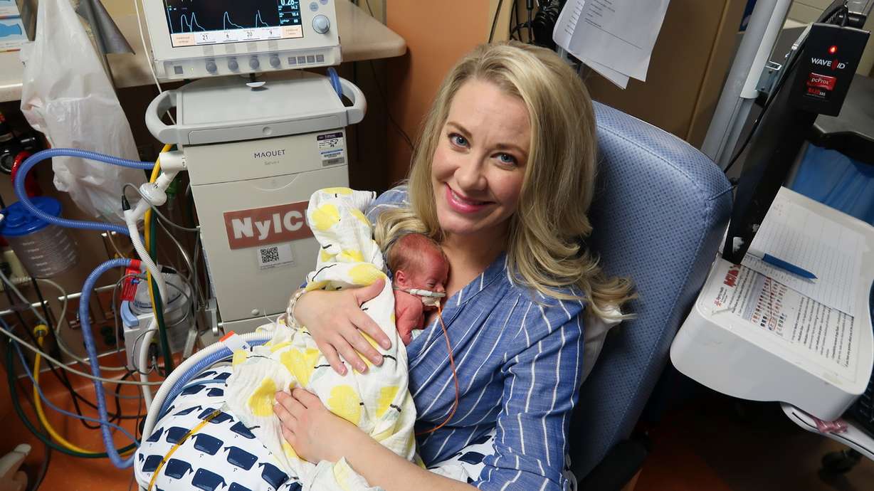 Jamie Scott holds one of her quintuplets at St. Joseph's Hospital in Phoenix, Arizona. (Photo: Photo courtesy of Skyler and Jamie Scott)